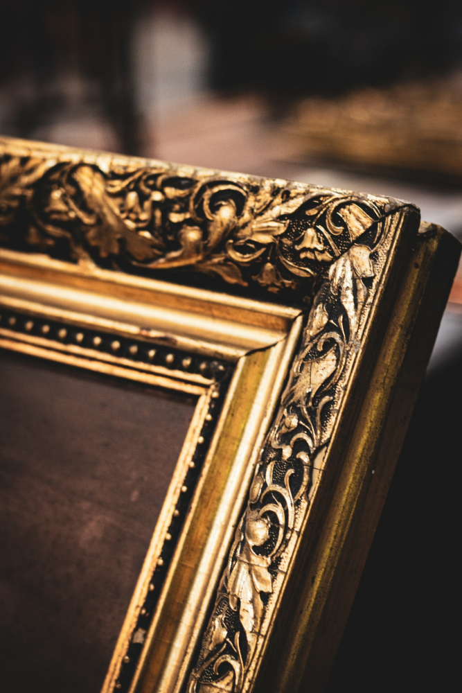 Close up of an ornate gold frame