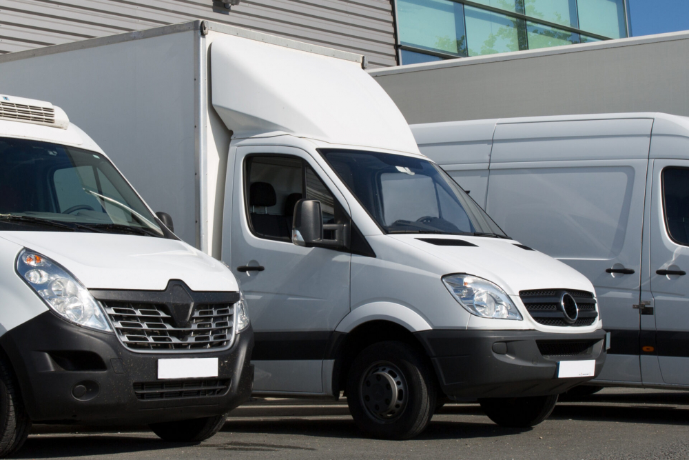 Luton vans parked in a line.